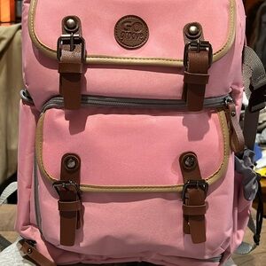 NEW w/out tags, pink camera backpack! Great for organizing.